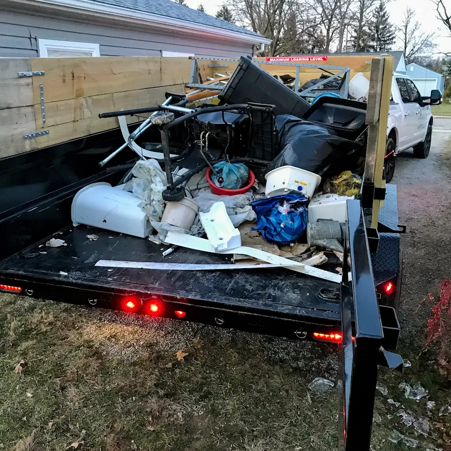 Roll-off dumpster delivered to a residential driveway in Watergate